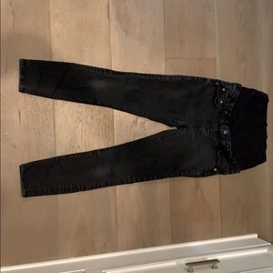Black Zara maternity jeans with cover over belly